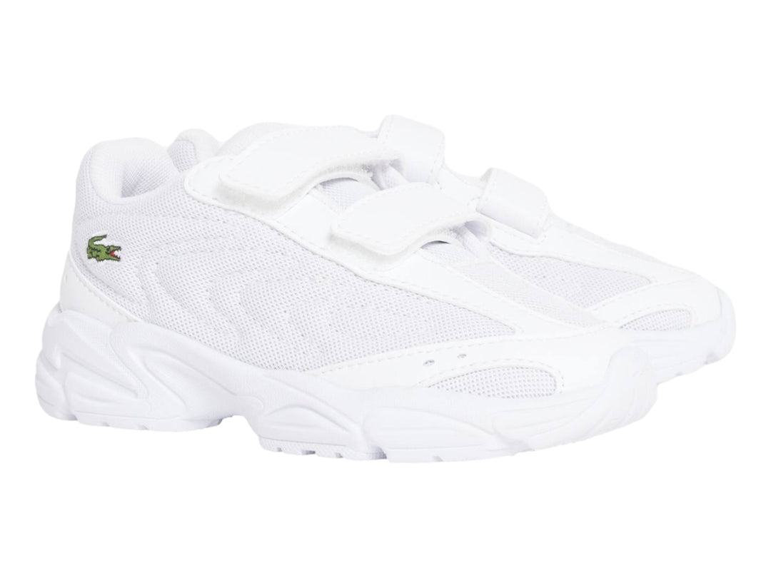 Tenis Lacoste Storm 96 2K Lite blancos con cierres de velcro y suela robusta.