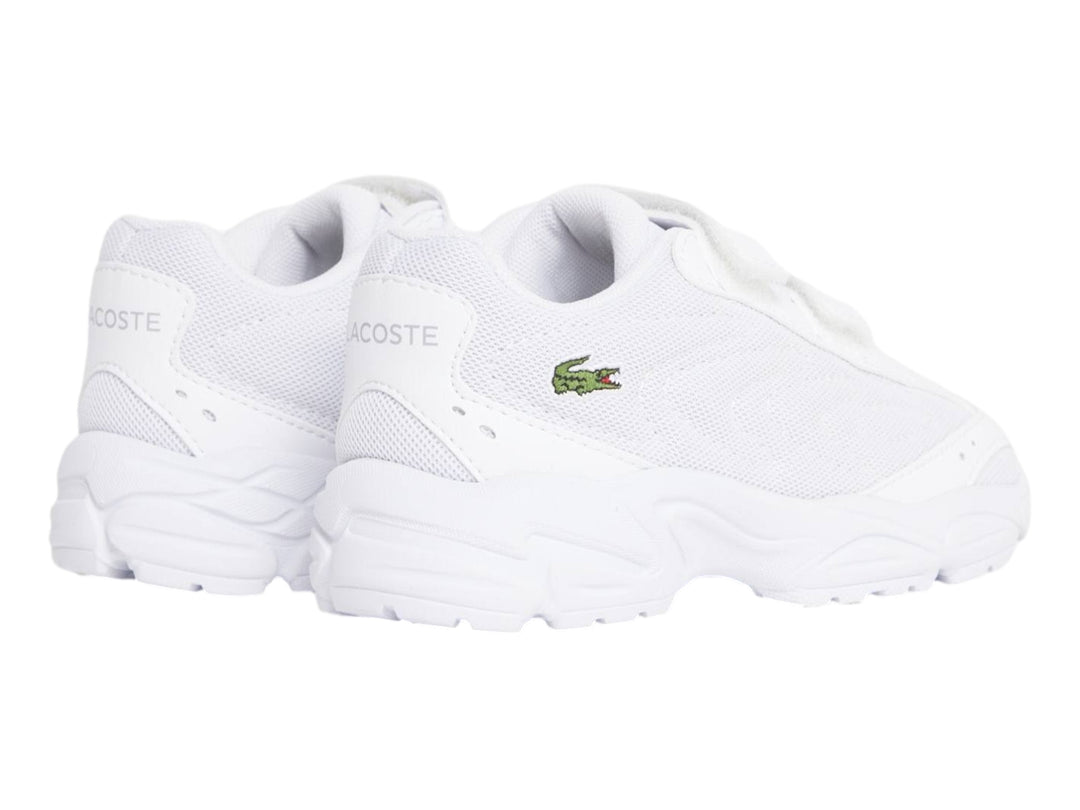 Tenis Lacoste Storm 96 2K Lite blancos con cierres de velcro y suela robusta.