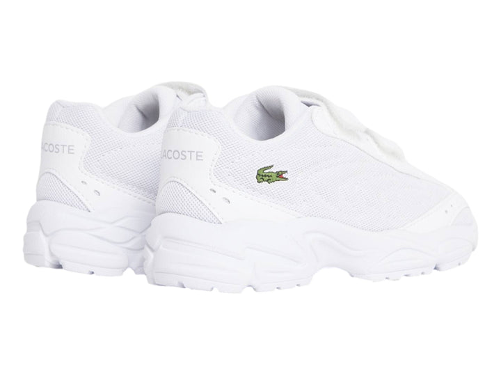 Tenis Lacoste Storm 96 2K Lite blancos con cierres de velcro y suela robusta.