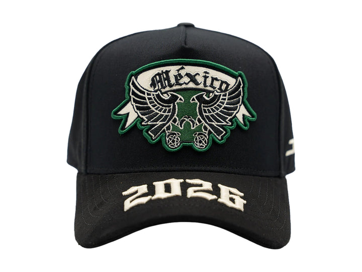 Gorra negra JC Hats con parche de México en verde y blanco y bordado 2026 en la visera.
