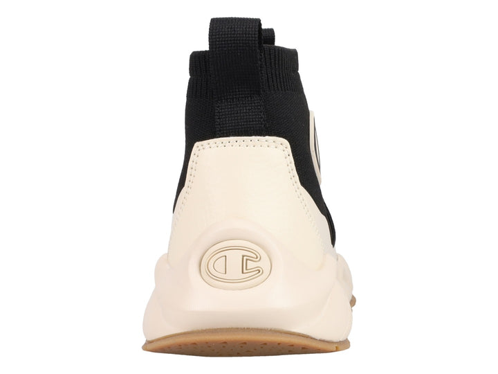 Tenis Champion Rally Pro MG en color negro y blanco con diseño tipo calcetín y suela gruesa color crema.