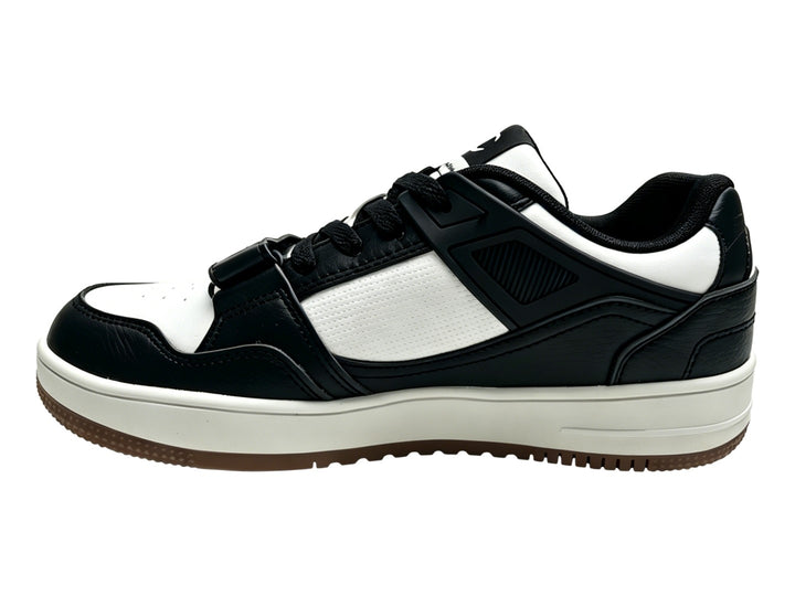 Tenis Champion Ace Cross en colores negro y blanco con suela blanca y detalle de correa velcro.