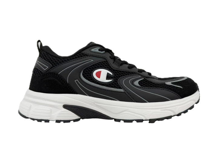 Tenis Champion Libranta en color negro con detalles en gris y suela blanca gruesa.