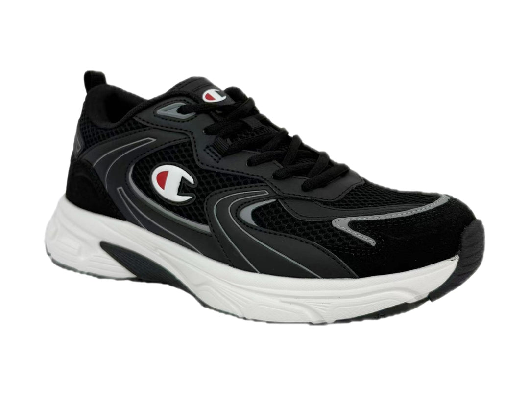 Tenis Champion Libranta en color negro con detalles en gris y suela blanca gruesa.