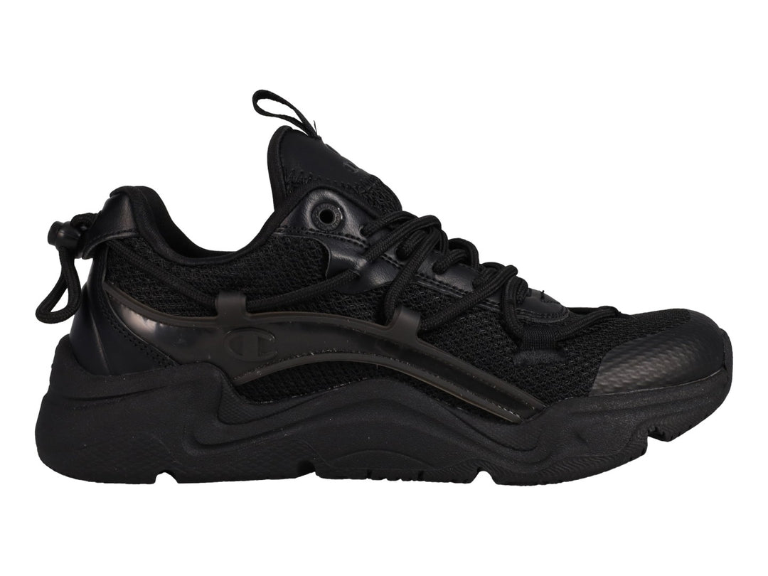 Tenis Champion Hyper C Pilot en color negro total para junior, con suela robusta y detalles en malla y sintético.
