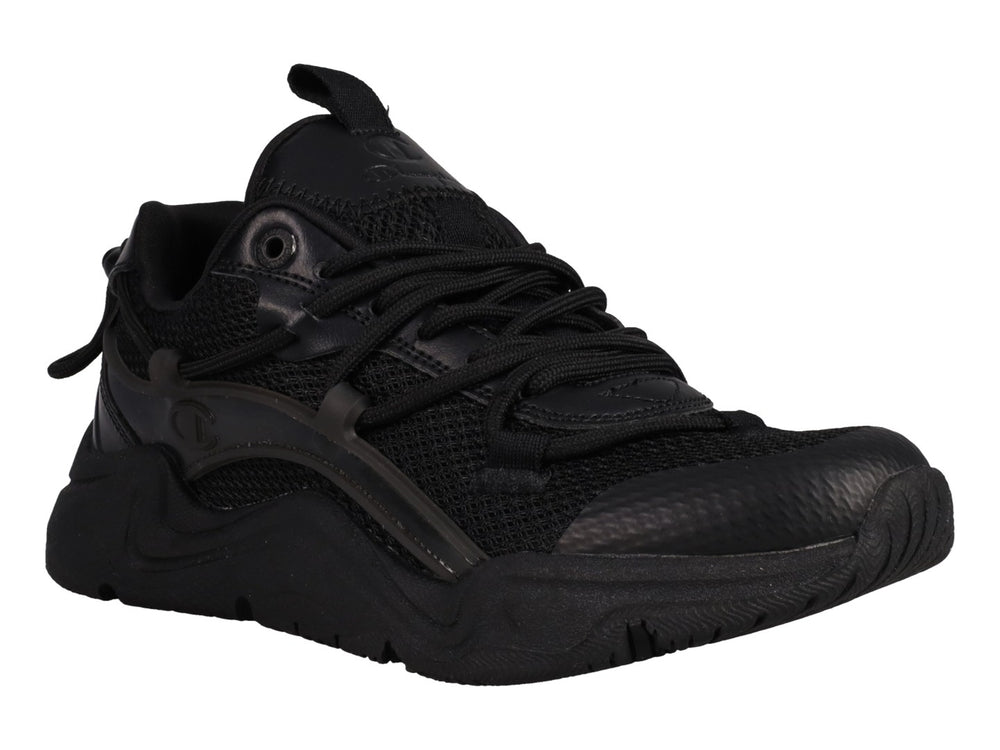 Tenis Champion Hyper C Pilot en color negro total para junior, con suela robusta y detalles en malla y sintético.