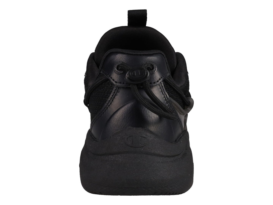 Tenis Champion Hyper C Pilot en color negro total para junior, con suela robusta y detalles en malla y sintético.