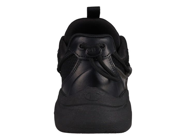 Tenis Champion Hyper C Pilot en color negro total para junior, con suela robusta y detalles en malla y sintético.