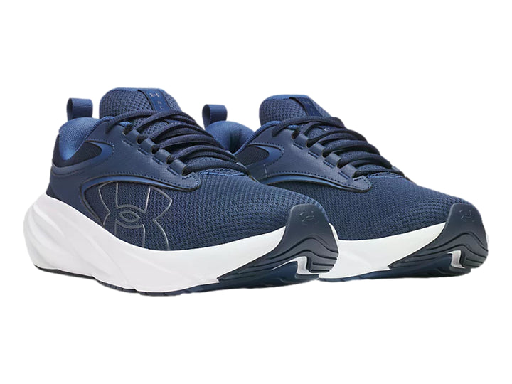 Tenis deportivos Under Armour color azul con suela blanca y detalles en gris.