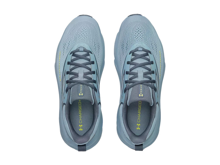 Tenis deportivos Under Armour color azul con suela gruesa y malla transpirable.
