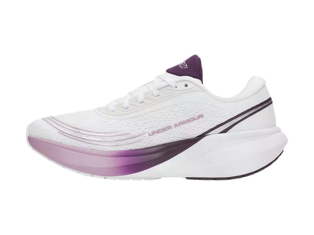 Tenis deportivos Under Armour color blanco con detalles en degradado morado y rosa.