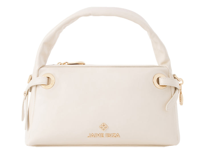 Bolsa de mano color beige de Jaime Ibiza con asa superior y detalles dorados.