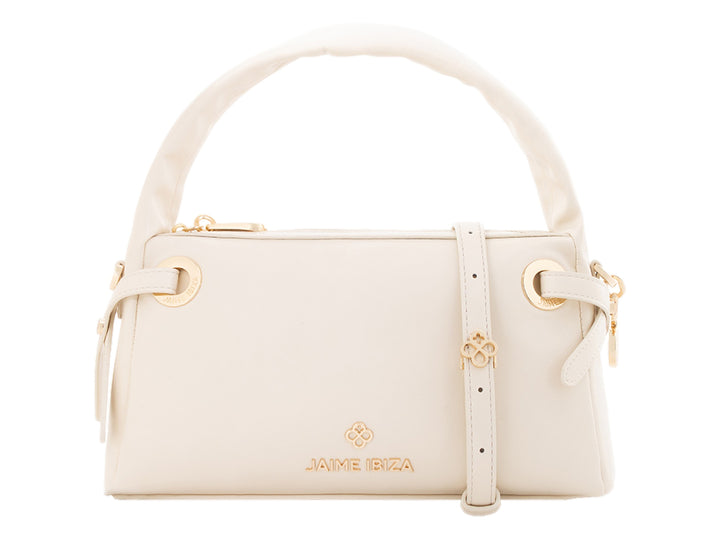 Bolsa de mano color beige de Jaime Ibiza con asa superior y detalles dorados.