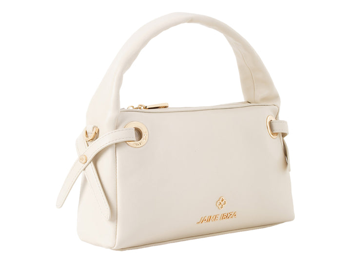 Bolsa de mano color beige de Jaime Ibiza con asa superior y detalles dorados.