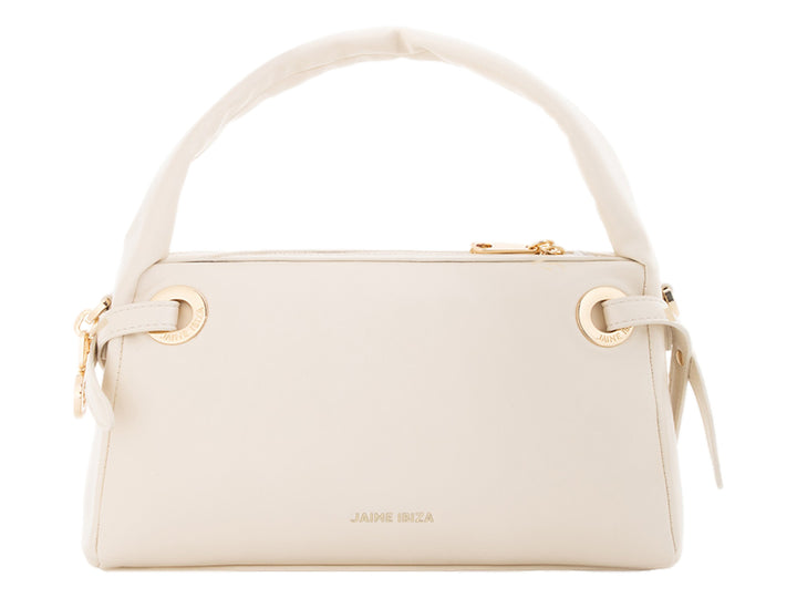 Bolsa de mano color beige de Jaime Ibiza con asa superior y detalles dorados.