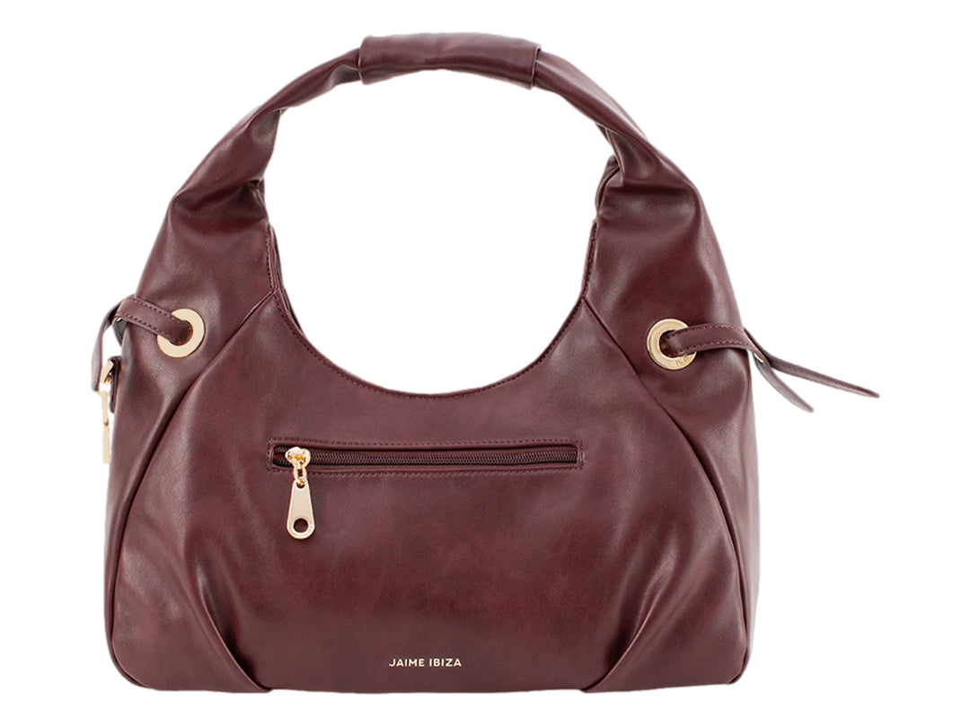 Bolsa de mano color burgundy de Jaime Ibiza con detalles metálicos dorados y asa integrada.