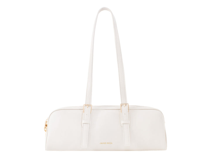 Bolsa de mano color beige de Jaime Ibiza con asas largas y detalles metálicos dorados.