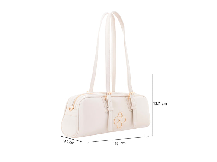 Bolsa de mano color beige de Jaime Ibiza con asas largas y detalles metálicos dorados.