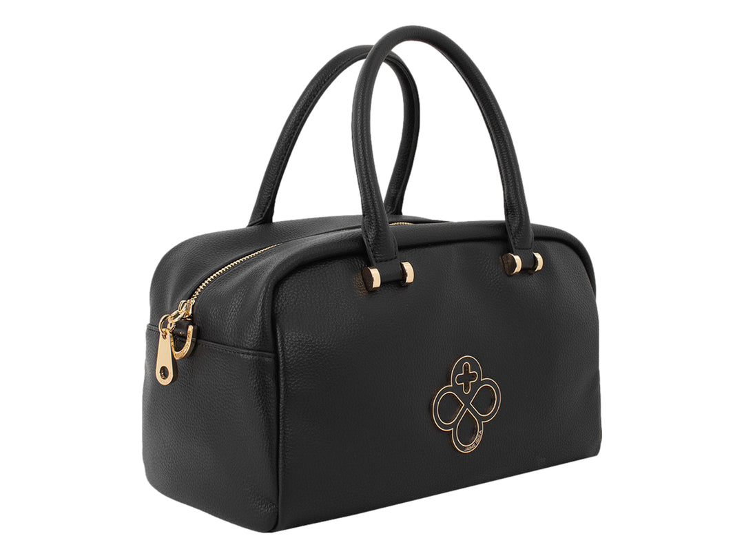 Bolsa negra de Jaime Ibiza con detalles dorados, asa superior y correa ajustable.