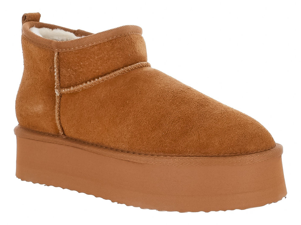 Botas invernales Madden Girl color café castaño con plataforma alta y acabado tipo gamuza.