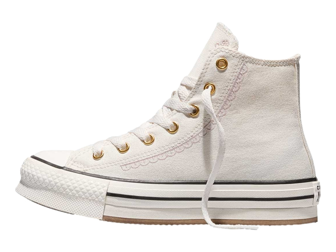 Tenis Converse Chuck Taylor All Star blancos de bota alta con suela de plataforma para junior.