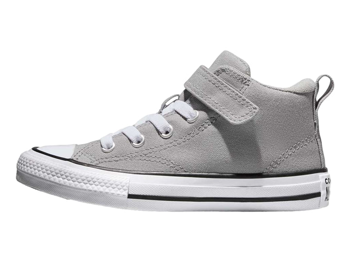 Tenis Converse color gris con suela blanca, agujetas y correa de velcro.