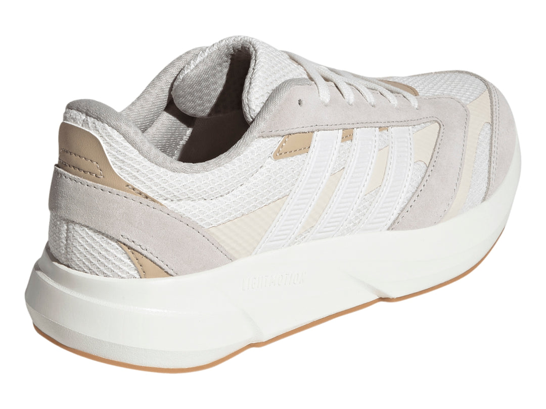 Tenis Adidas Lightshift 2.0 color blanco con detalles beige y suela blanca.