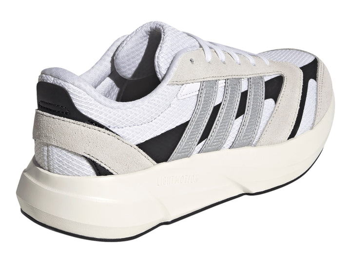 Tenis Adidas Lightshift 2.0 blancos con franjas plateadas y detalles negros, vista lateral.