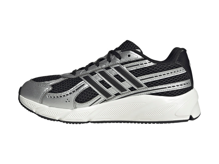 Tenis Adidas Technochaos 2000 en color negro y plata con suela blanca y detalles metálicos.