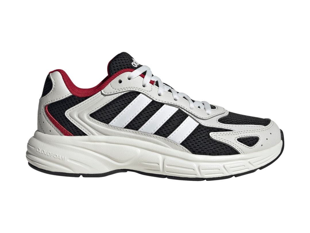 Tenis Adidas Eclyptix 2000 J en color negro con detalles en blanco y rojo, suela blanca gruesa y diseño deportivo.