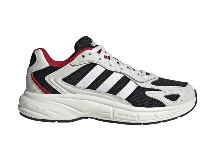 Tenis Adidas Eclyptix 2000 J en color negro con detalles en blanco y rojo, suela blanca gruesa y diseño deportivo.