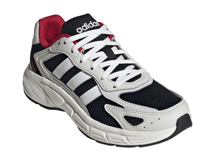 Tenis Adidas Eclyptix 2000 J en color negro con detalles en blanco y rojo, suela blanca gruesa y diseño deportivo.