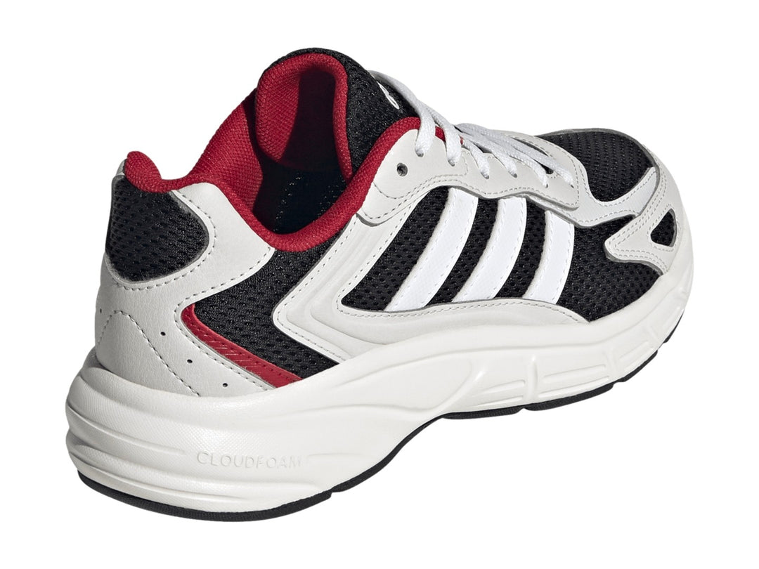 Tenis Adidas Eclyptix 2000 J en color negro con detalles en blanco y rojo, suela blanca gruesa y diseño deportivo.