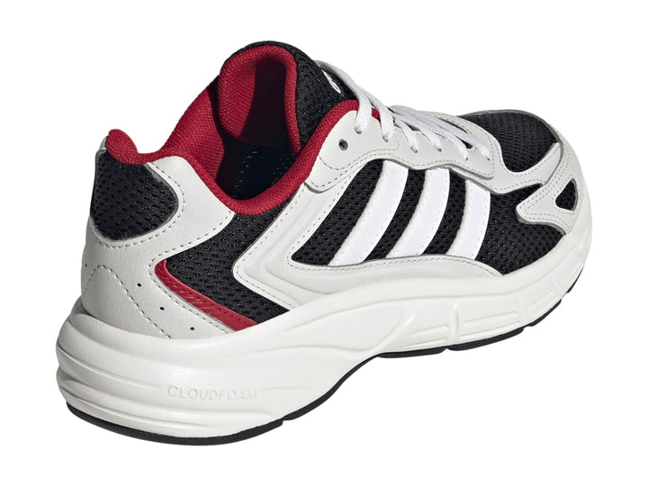 Tenis Adidas Eclyptix 2000 J en color negro con detalles en blanco y rojo, suela blanca gruesa y diseño deportivo.