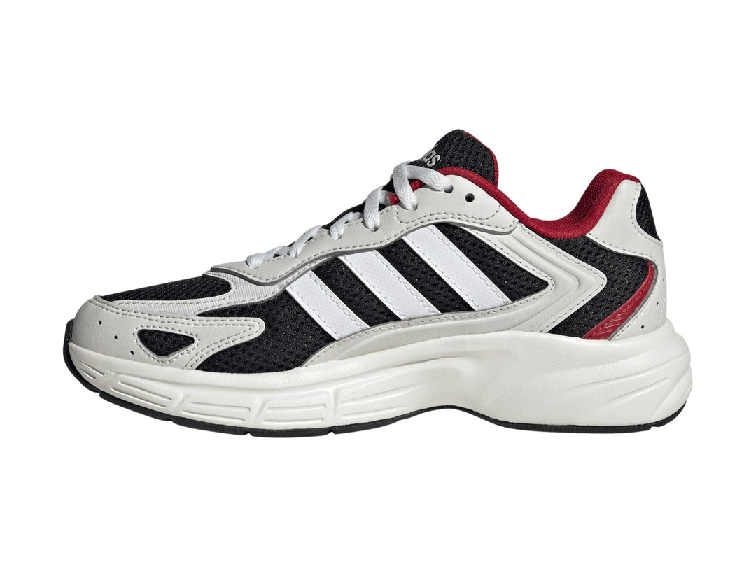 Tenis Adidas Eclyptix 2000 J en color negro con detalles en blanco y rojo, suela blanca gruesa y diseño deportivo.