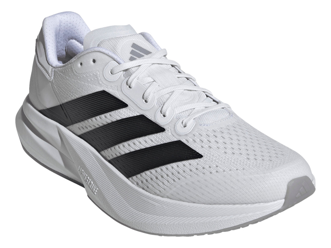 Tenis Adidas Duramo Speed 2 color blanco con tres franjas negras laterales y suela blanca.