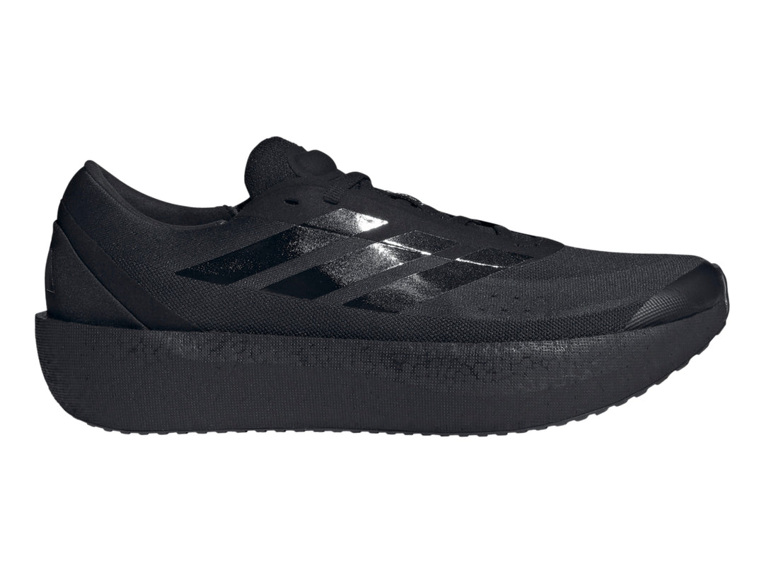 Tenis deportivos Adidas Zenboost color negro con suela gruesa y franjas laterales brillantes.