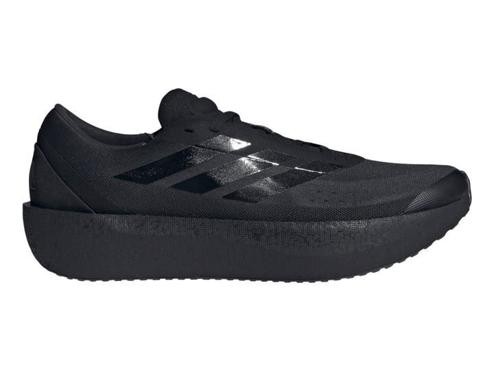 Tenis deportivos Adidas Zenboost color negro con suela gruesa y franjas laterales brillantes.