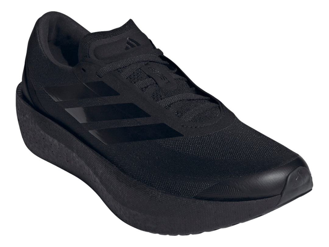 Tenis deportivos Adidas Zenboost color negro con suela gruesa y franjas laterales brillantes.