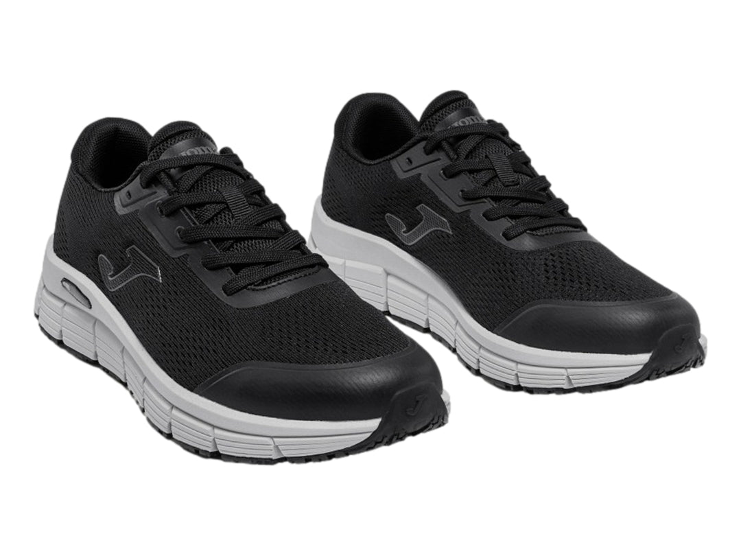 Tenis deportivos Joma Zen 2601 en color negro con suela gris claro.