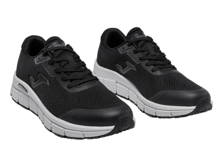 Tenis deportivos Joma Zen 2601 en color negro con suela gris claro.