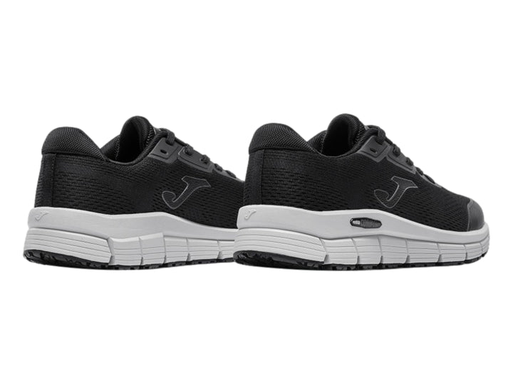 Tenis deportivos Joma Zen 2601 en color negro con suela gris claro.