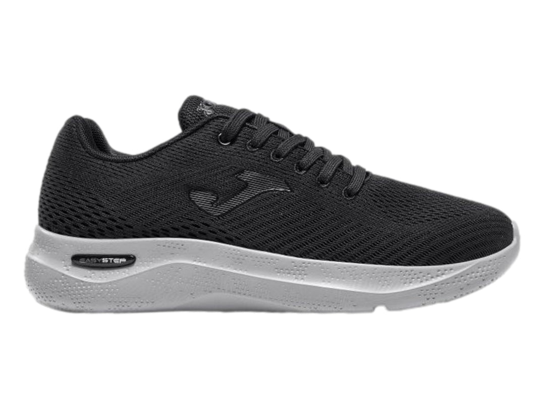 Tenis deportivos Joma Corinto color negro con suela blanca.