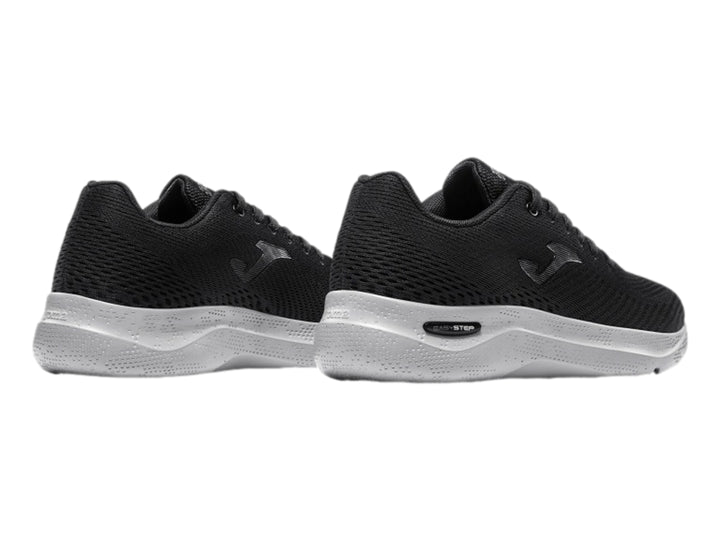 Tenis deportivos Joma Corinto color negro con suela blanca.