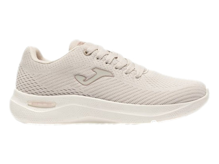 Tenis deportivos Joma Corinto color beige con tejido de malla y suela blanca.