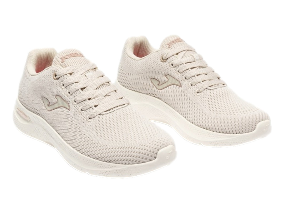 Tenis deportivos Joma Corinto color beige con tejido de malla y suela blanca.
