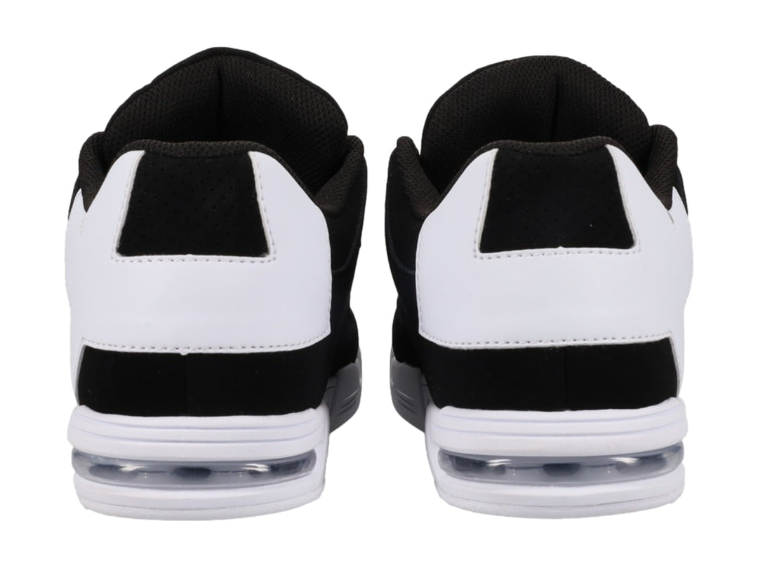 Tenis DC Shoes DC Command color negro con detalles y suela blanca.