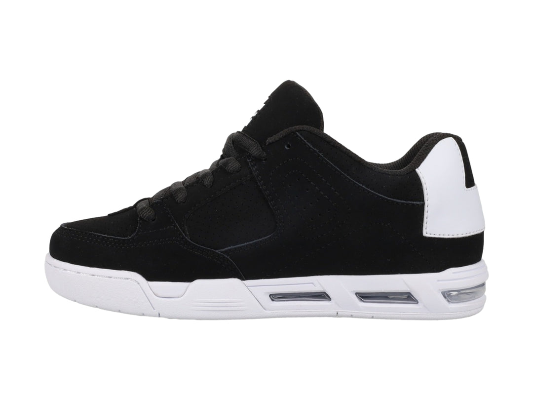 Tenis DC Shoes DC Command color negro con detalles y suela blanca.