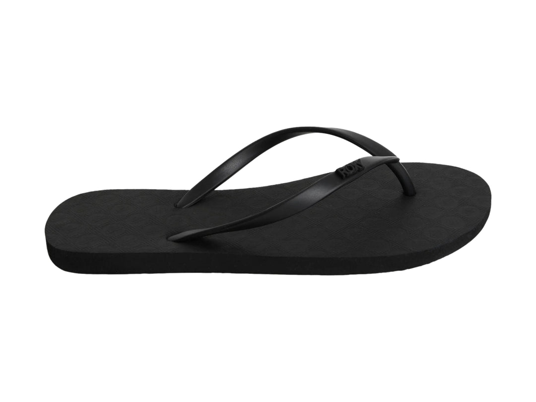Sandalia de dedo color negro marca Roxy con suela texturizada.
