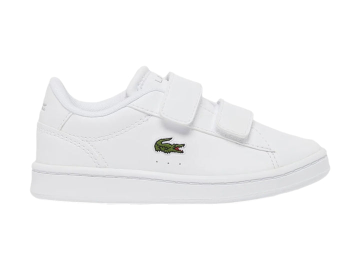 Tenis blancos Lacoste Carnaby Set con cierre de velcro y logotipo del cocodrilo en el costado.